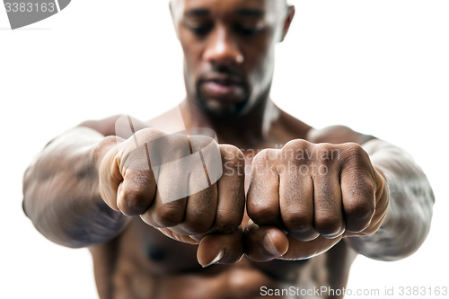 Image of Man Showing Fists and Knuckles