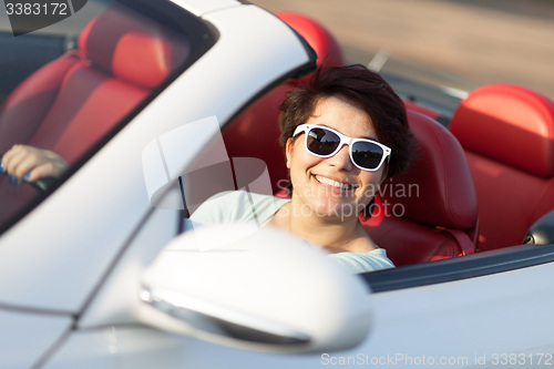 Image of Woman Driving a Convertible