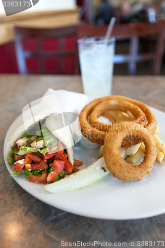 Image of Chicken Pita Wrap and Onion Rings