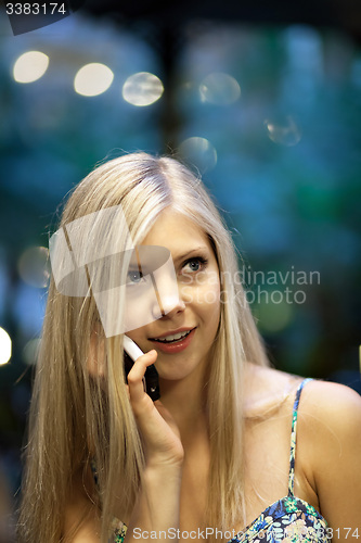 Image of Blonde Woman on Cell Phone