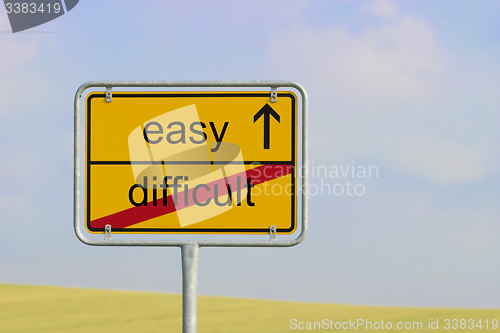 Image of Sign difficult easy