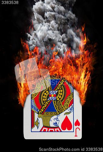 Image of Playing card with fire and smoke