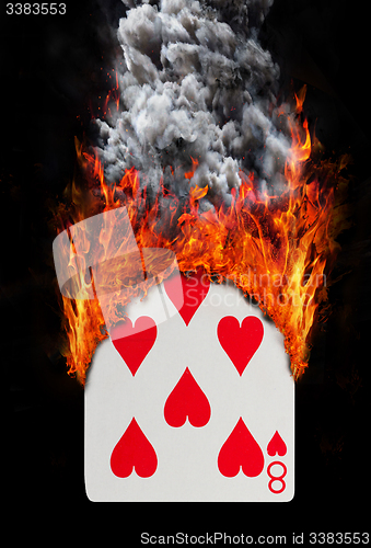 Image of Playing card with fire and smoke