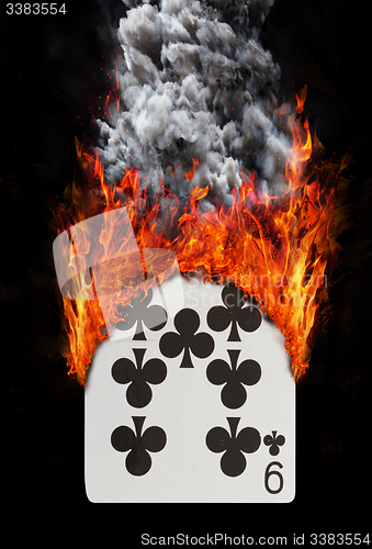 Image of Playing card with fire and smoke