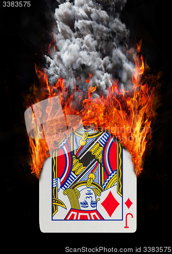 Image of Playing card with fire and smoke