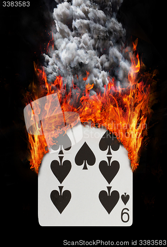 Image of Playing card with fire and smoke