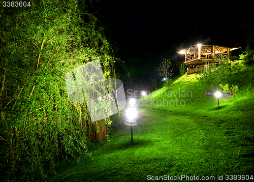 Image of Wooden arbour at night