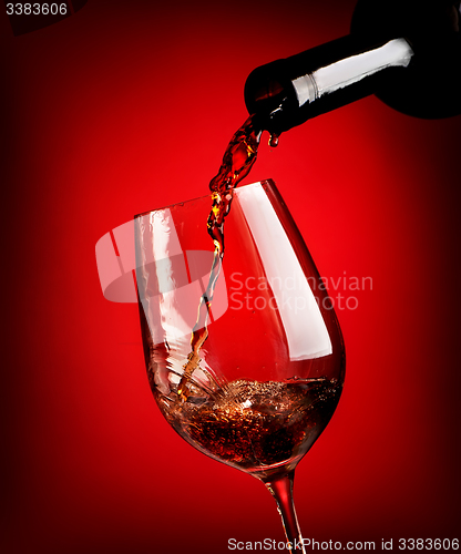 Image of Red wine on red background