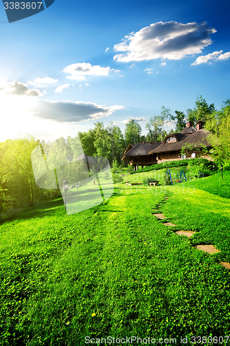 Image of Wooden houses on meadow