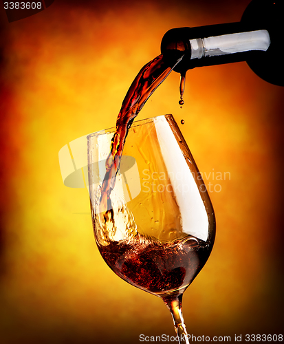 Image of Red wine on orange background