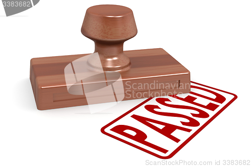 Image of Wooden stamp passed with red text