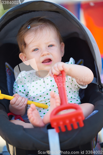 Image of portrait of baby in carriage