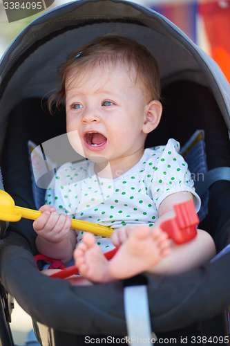 Image of portrait of baby in carriage