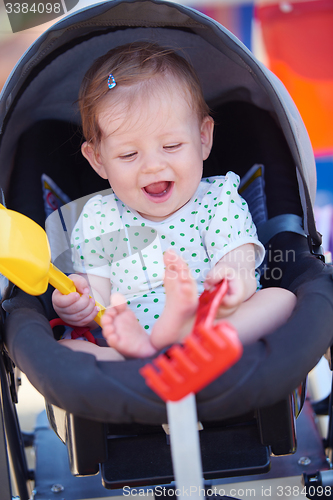 Image of portrait of baby in carriage