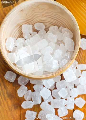 Image of White sugar in the wooden vase