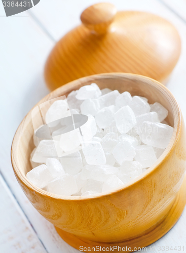 Image of White sugar in the wooden vase