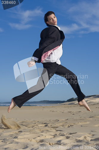 Image of Jumping business professional