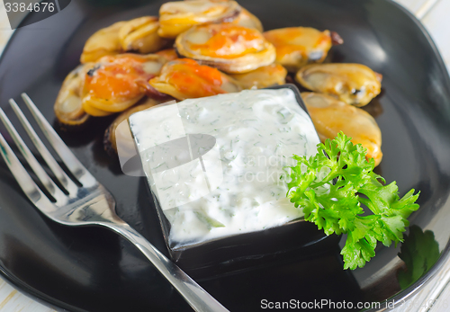 Image of mussels with sauce