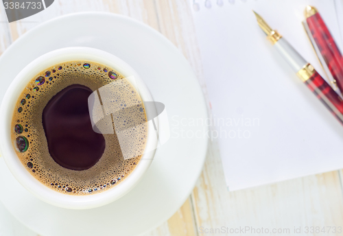 Image of coffee and note