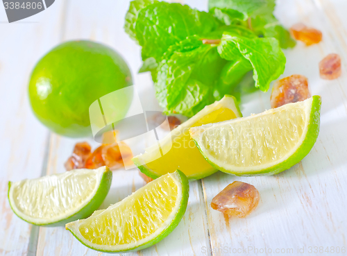 Image of lime with mint and sugar