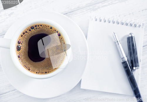 Image of coffee and note