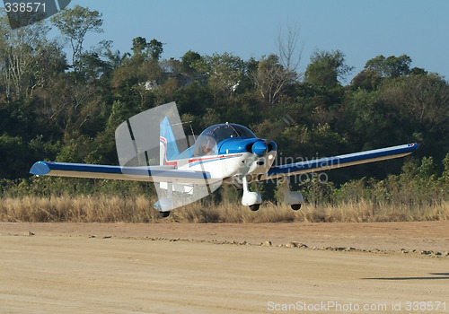 Image of Small airplane landing