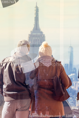 Image of Tourist taking photo of New York City.