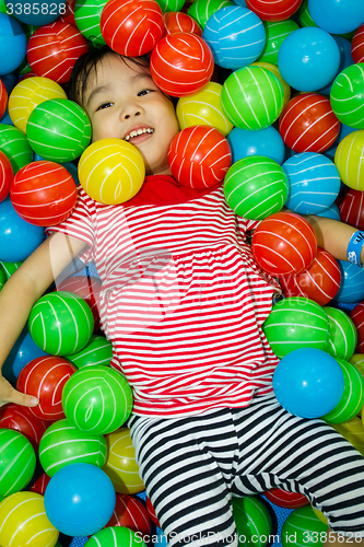 Image of Asian Chinese Girl In Ball Pool