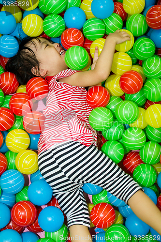 Image of Asian Chinese Girl In Ball Pool