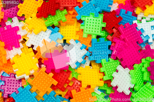 Image of Colorful jigsaw puzzle close up.