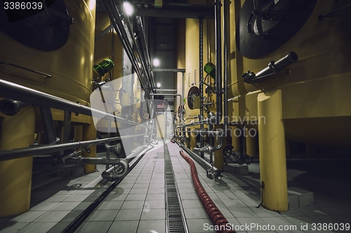 Image of Industrial interior with welded silos