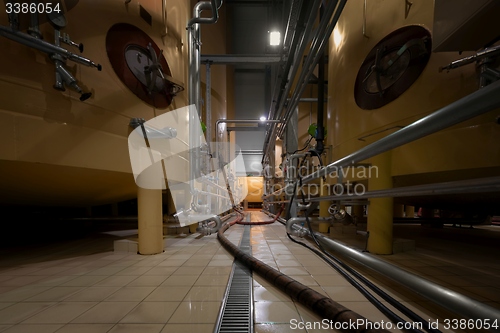 Image of Industrial interior with welded silos