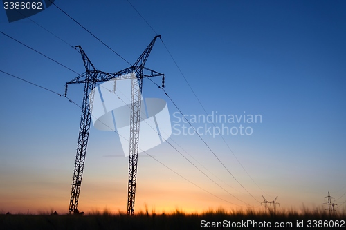 Image of Large transmission towers at blue hour 