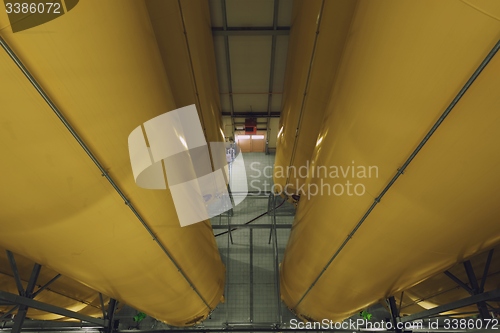 Image of Industrial interior with welded silos