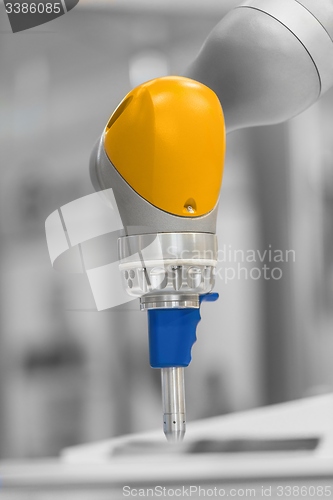 Image of Robotic arm closeup photo