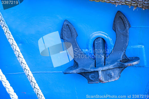 Image of Anchor on blue ship