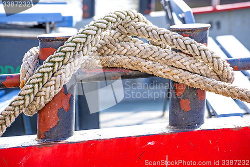 Image of Cleat with mooring line of a trawler