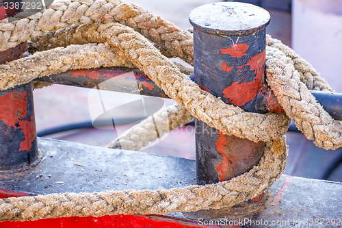 Image of Cleat with mooring line of a trawler