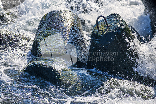 Image of wave-breaker with spindrift