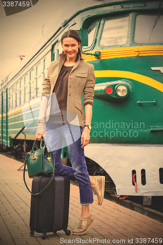 Image of smiling woman traveler