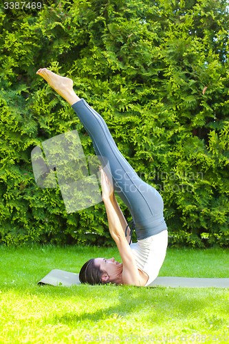 Image of woman doing yoga