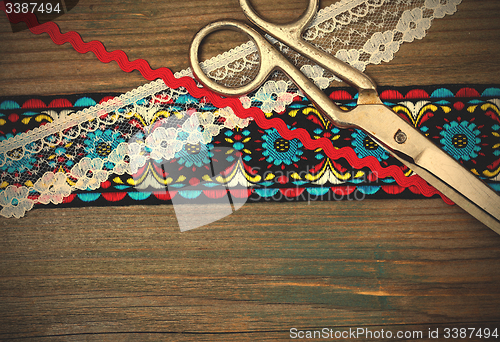 Image of vintage scissors and antique ribbons