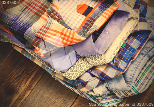 Image of summer shirts in a pile