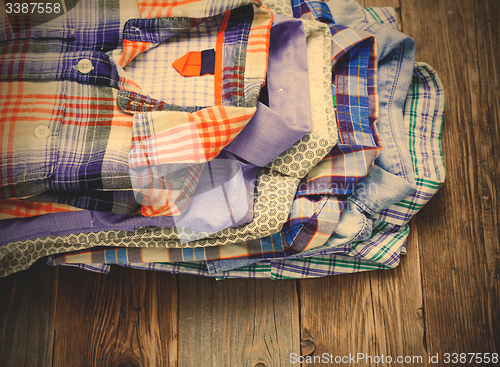 Image of shirts in a pile