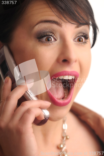 Image of screaming pretty sexy young woman with cellphone