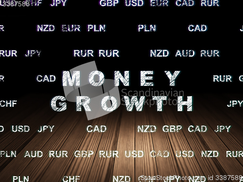 Image of Money concept: Money Growth in grunge dark room