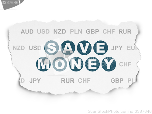Image of Currency concept: Save Money on Torn Paper background