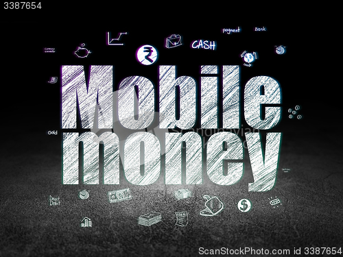 Image of Money concept: Mobile Money in grunge dark room