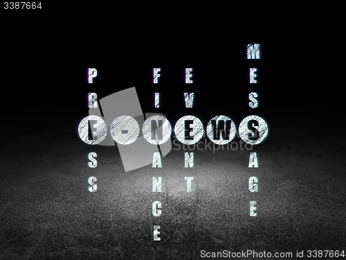 Image of News concept: word E-news in solving Crossword Puzzle