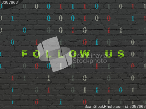Image of Social network concept: Follow us on wall background